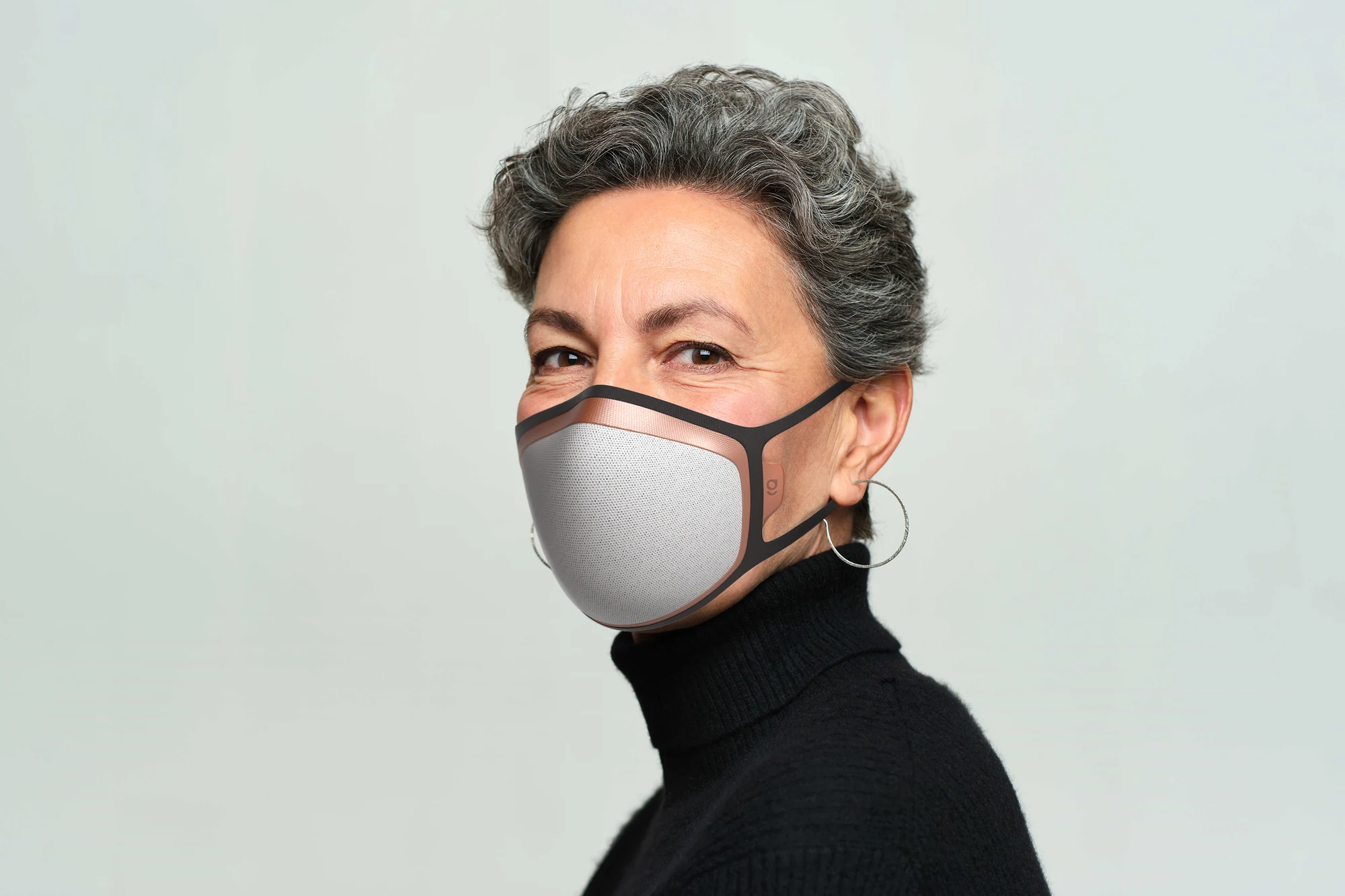 Close view of the Galvan mask worn on a woman’s face