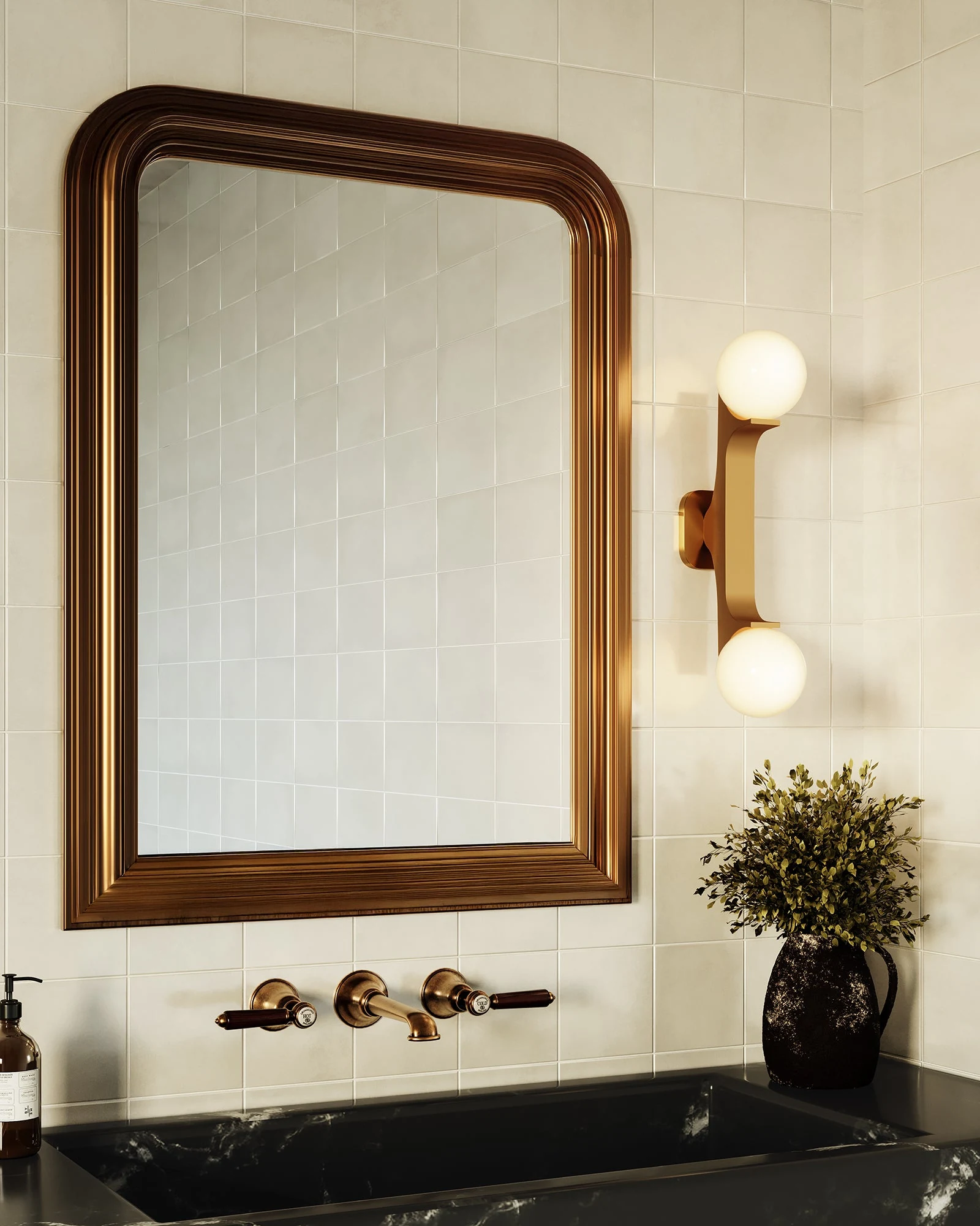Briar wall sconce beside a bathroom mirror