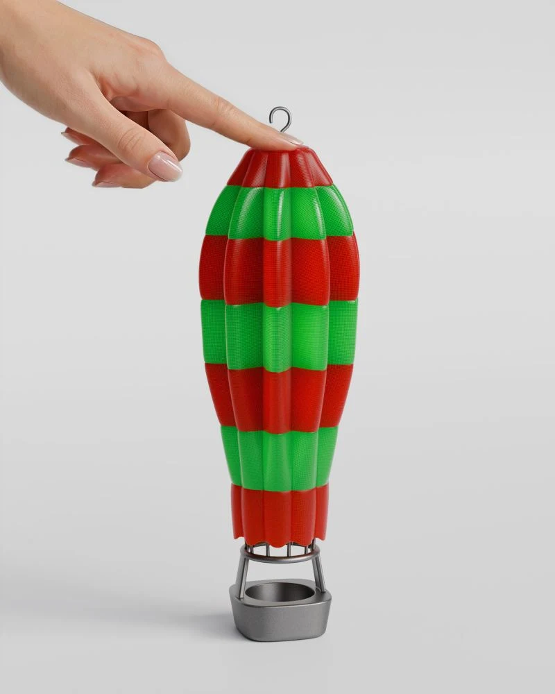 The balloon-shaped holder shown extended by a hand