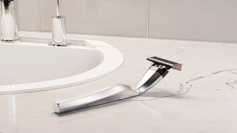 Morning Edge razor resting blade-up beside a basin